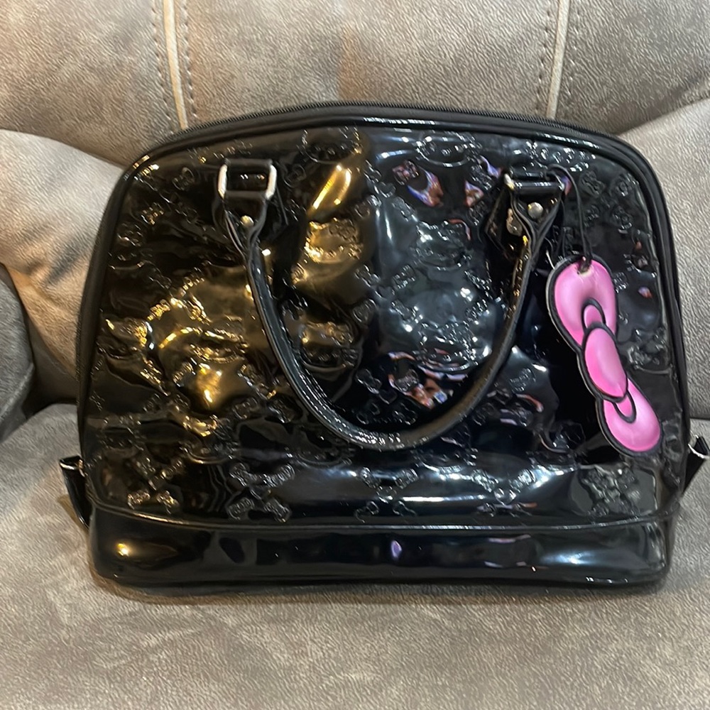 Hello Kitty Loungefly Satchel/Bowler Bag Black Purse, comes with dust bag.